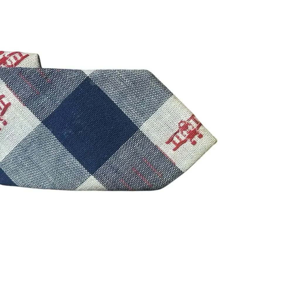 Boys blue clip on tie featuring a plane